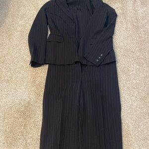 Black  pinstripe pant suit.